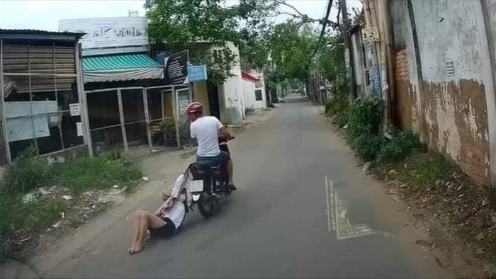 Tên cướp kéo lê cô gái hơn 500m trên đường phố Sài Gòn - 2
