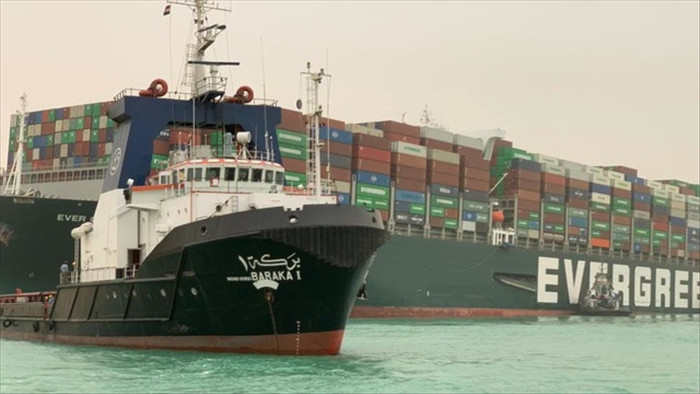 Giá dầu, thương mại toàn cầu bị ảnh hưởng từ vụ tàu bịt kênh đào Suez - 1