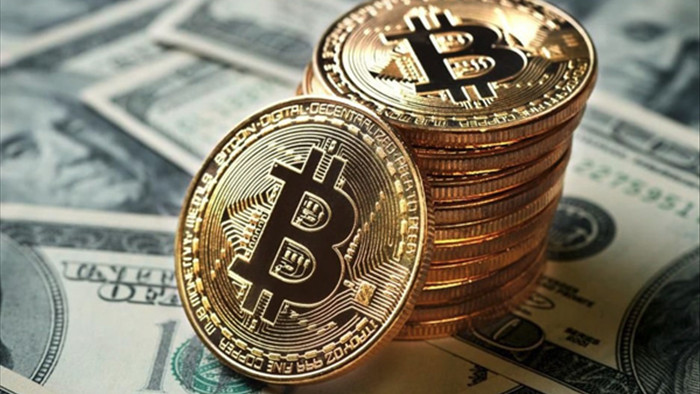 Bitcoin phá đỉnh, cán mốc 63.000 USD