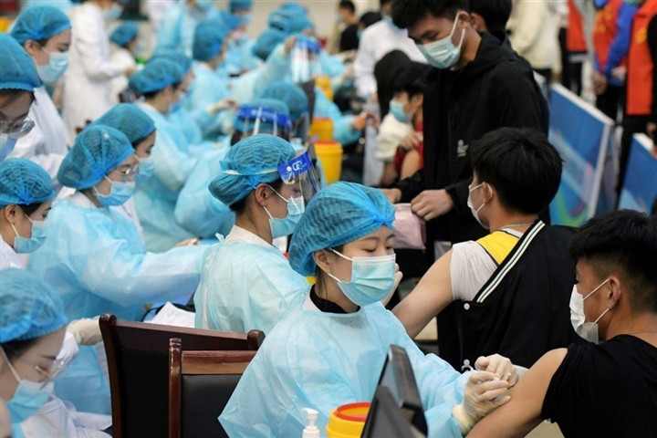 Vì sao Trung Quốc cần tới 85% dân số tiêm vaccine?-1