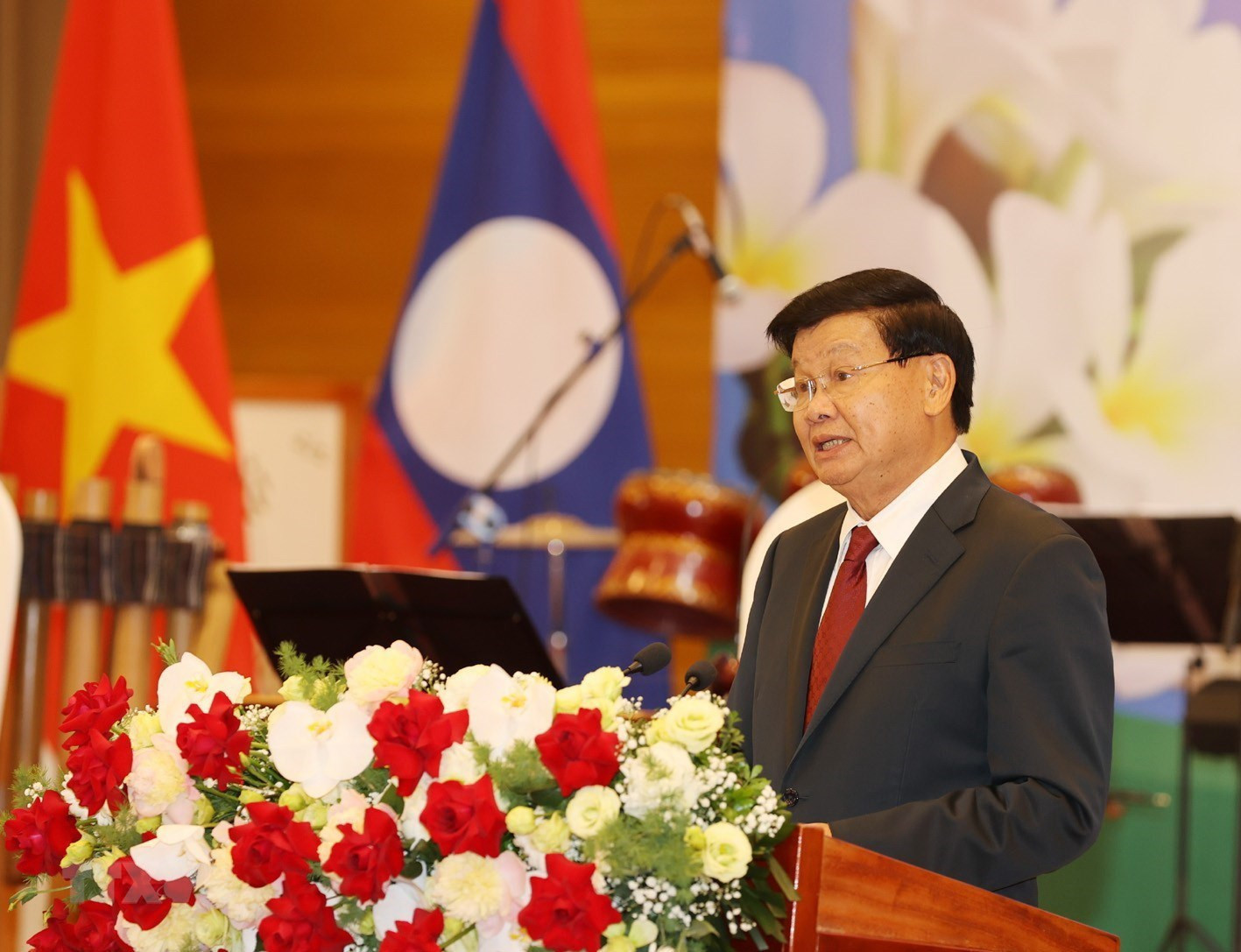 Tổng Bí thư, Chủ tịch nước Lào Thongloun Sisoulith đọc Diễn văn đáp từ. (Ảnh: Trí Dũng/TTXVN)