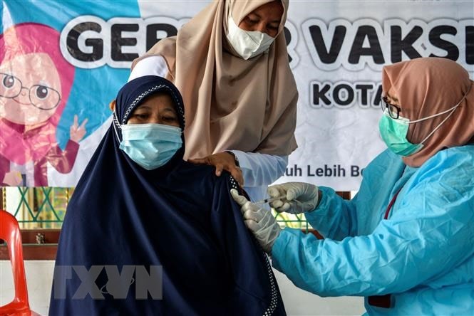 Dịch COVID-19: Indonesia quyết định áp đặt lệnh phong tỏa khẩn cấp hình ảnh 1 Dich COVID-19: Indonesia quyet dinh ap dat lenh phong toa khan cap hinh anh 1