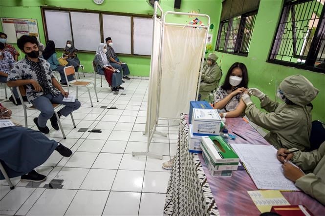 Indonesia áp đặt lệnh phong tỏa một phần tại các điểm nóng dịch bệnh hình ảnh 1 Indonesia ap dat lenh phong toa mot phan tai cac diem nong dich benh hinh anh 1