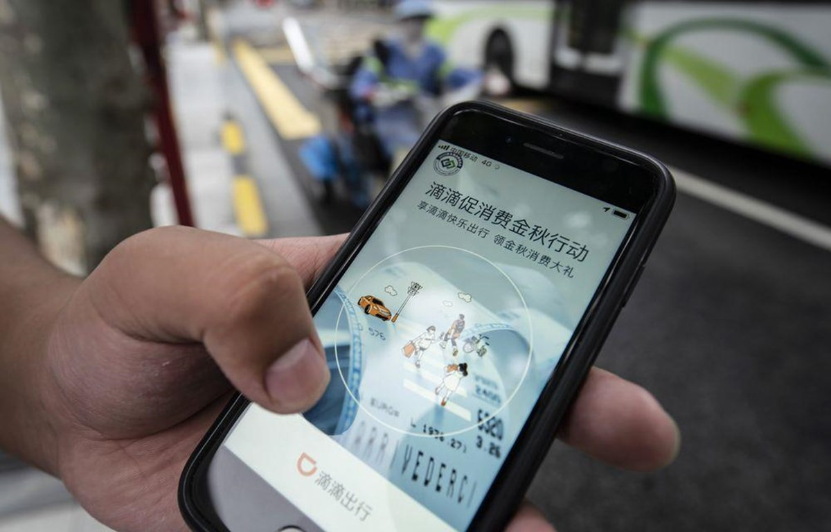 Ứng dụng đặt xe của Didi Global Inc trên điện thoại tại Trung Quốc. (Nguồn: Blooberg)