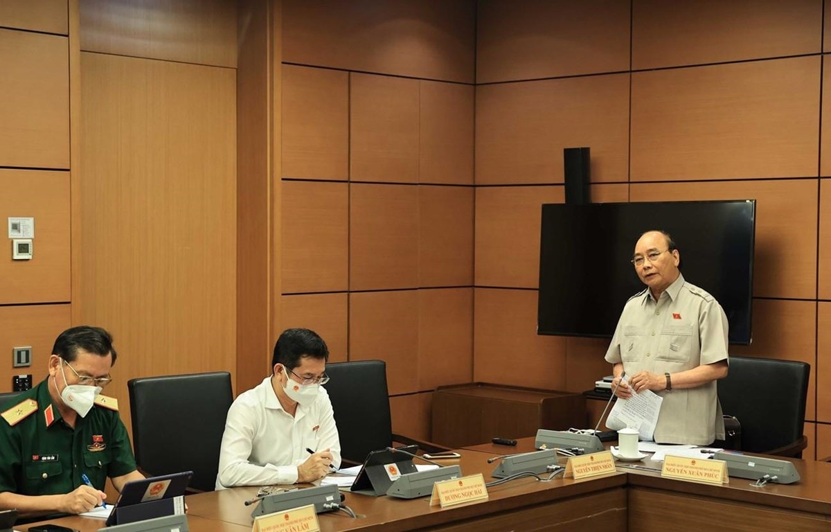 Chủ tịch nước Nguyễn Xuân Phúc phát biểu tại tổ. )Ảnh: Thống Nhất-TTXVN)
