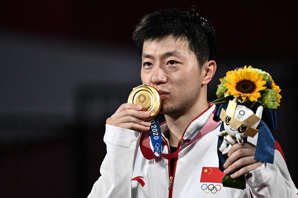 chinese-dictator-ma-long-retains-olympic-table-tennis-crown.jpg