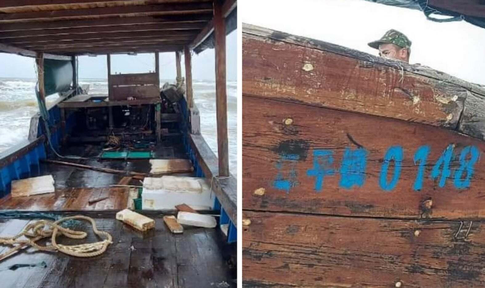 Tàu gỗ dài 18 mét in chữ Trung Quốc trôi dạt vào vùng biển Quảng Trị - 1