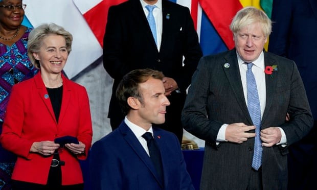 Hai nhà lãnh đọa Anh-Pháp gặp nhau bên lề Hội nghị G20 tại Rome, Italy. (Nguồn: Guardian)