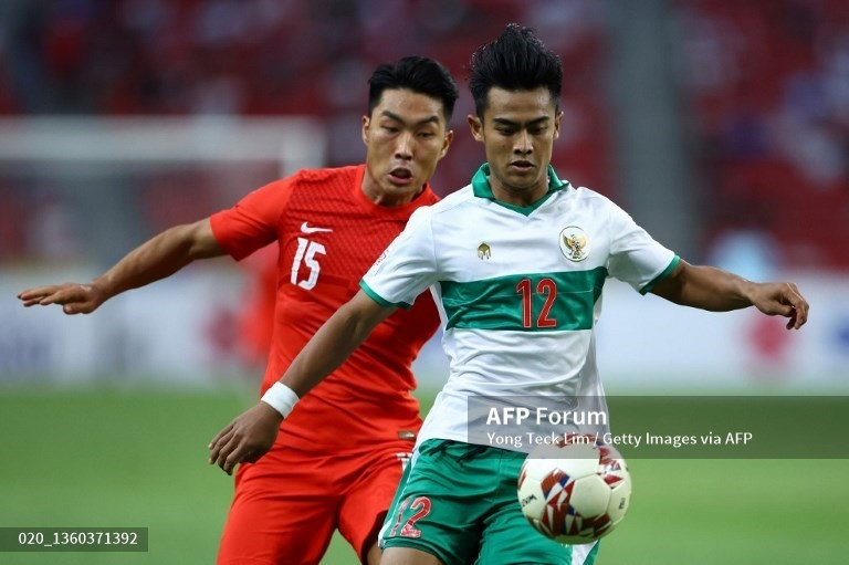 Tuyển Indonesia và Singapore hòa 1-1 ở bán kết lượt đi AFF Cup 2020. Ảnh: AFP