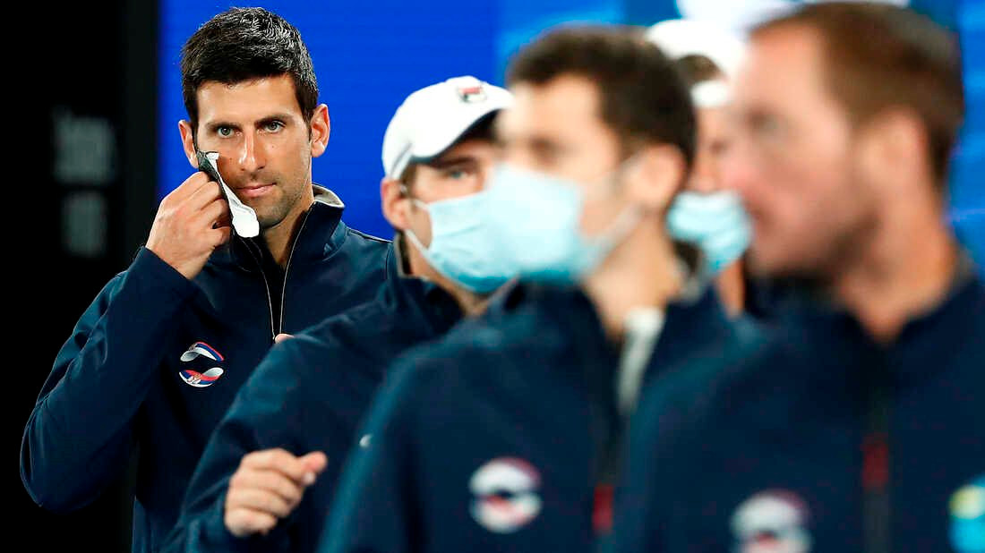 novak-djokovic-mask-covid-vaccine_wide-9debe01f6bc63dfd55a7a17e791f095e46749ca8-s1100-c50.jpg