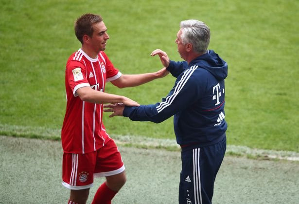 0_bayern-munichs-philipp-lahm-with-coach-carlo-ancelotti-as-he-is-substituted.jpg
