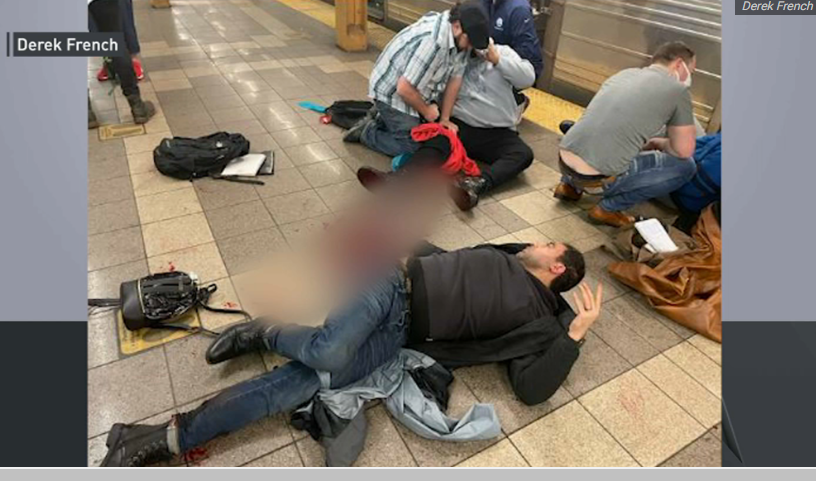 Ít nhất 13 người bị thương sau vụ nổ súng tại ga tàu điện ngầm ở New York - 1