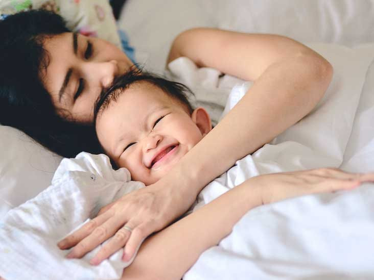 mother_holding_laughing_baby-732x549-thumbnail.jpg