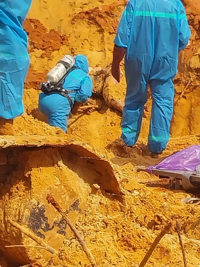 Tìm thấy thi thể cuối cùng trong vụ sập mỏ titan ở Bình Thuận - Ảnh 1.