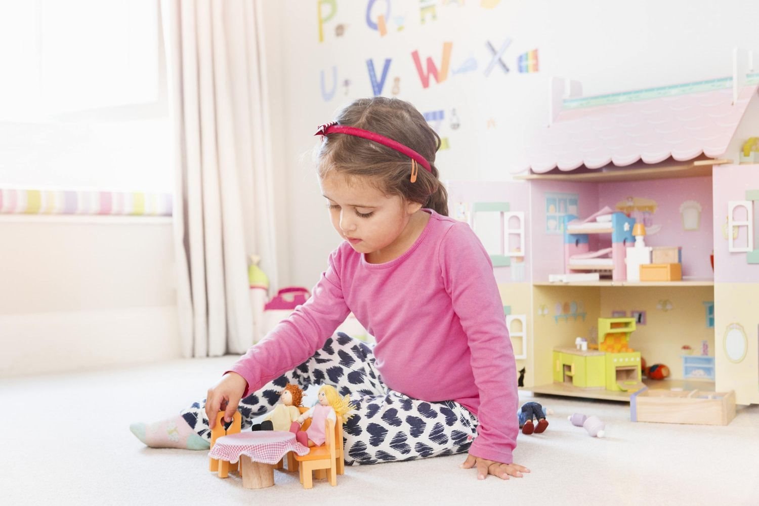 girl-playing-dolls-56a8fd373df78cf772a290f8.jpg