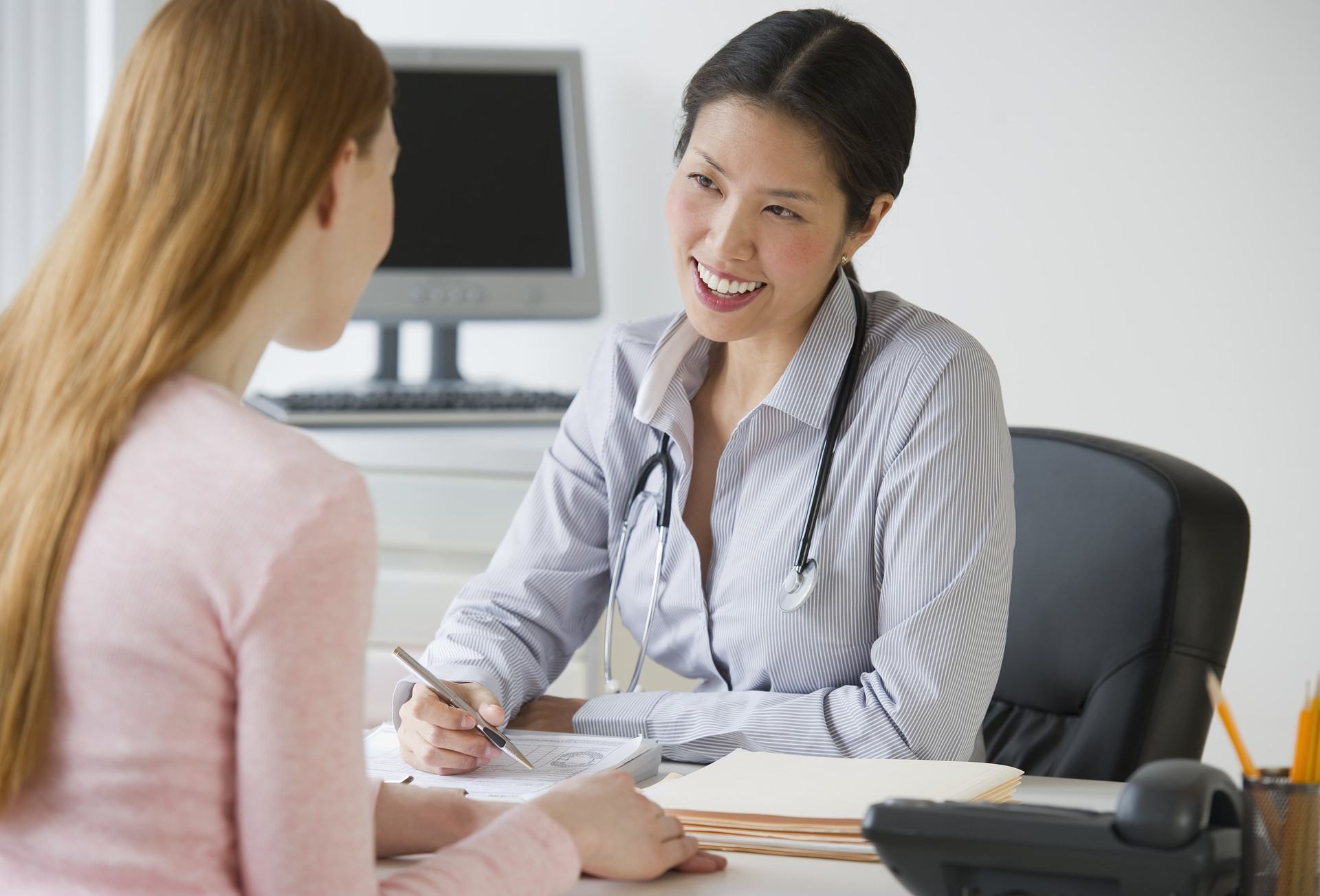 woman-consulting-doctor1.jpg