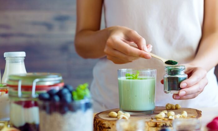 a-woman-preparing-a-spirulina-yogurt-for-gut-health-700x420.jpg