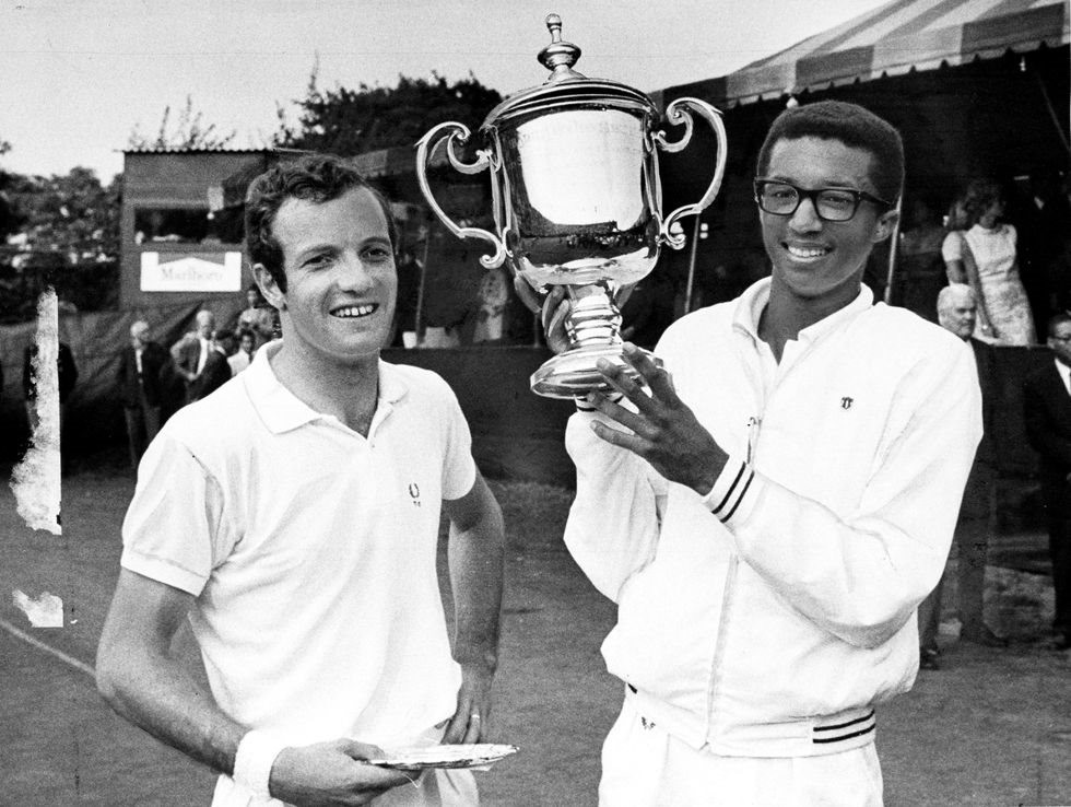 arthur-ashe-holds-trophy-after-defeating-tom-okker-of-the-news-photo-97251067-1566928460.jpg