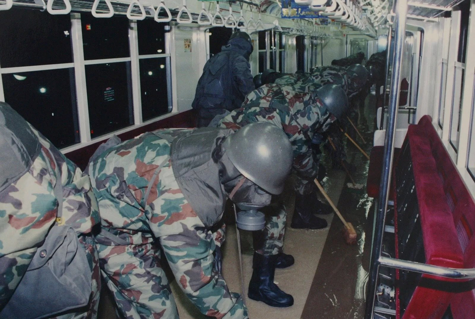 cleaning-sarin-off-subway-platforms-after-1995-sarin-gas-attacks-tokyo-japan_11zon.jpeg