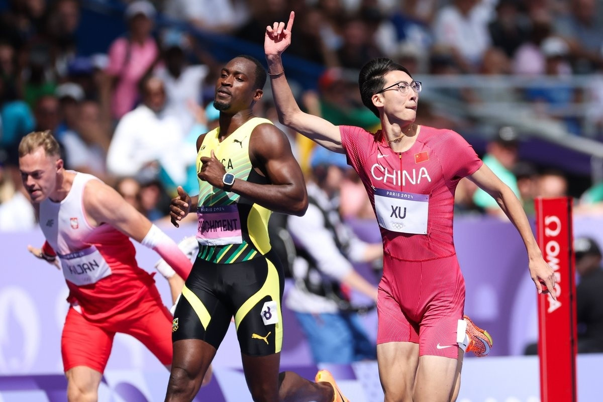 VĐV đeo kính như mọt sách, chạy nhanh như cơn gió ở Olympic - 3