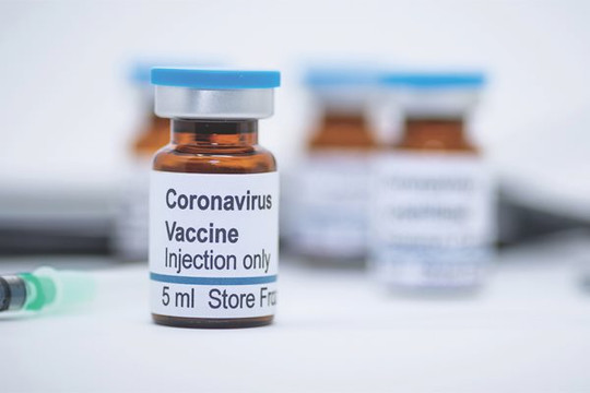 Triệu chứng Covid-19 liên quan tới số mũi vắc xin được tiêm