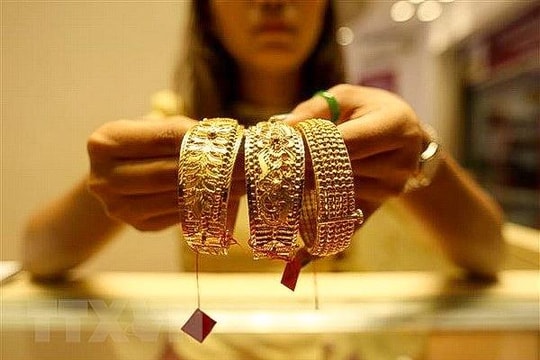 Suy thoái và thắt chặt, vàng mất động lực tăng giá