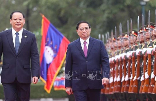 Lễ đón chính thức Thủ tướng Phạm Minh Chính tại Phủ Thủ tướng Lào