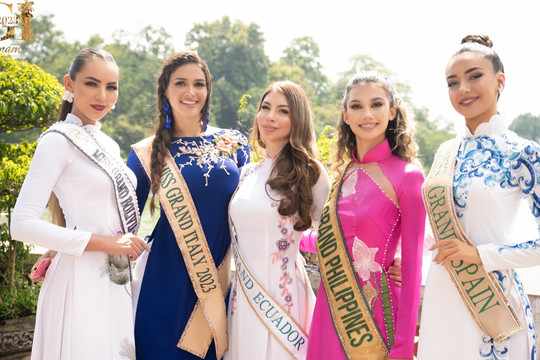 Thí sinh Miss Grand International 2023 đẹp rạng ngời trong tà áo dài Việt Nam