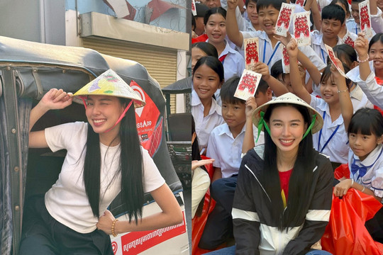 Hoa hậu Thùy Tiên: Đội nón lá, mặc giản dị mang Tết hạnh phúc cho kiều bào Campuchia