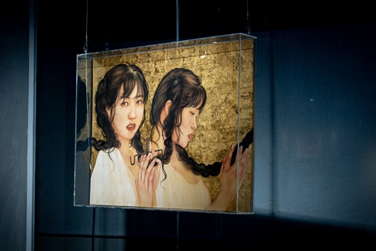 Female artist uses silk painting to create dream fragments