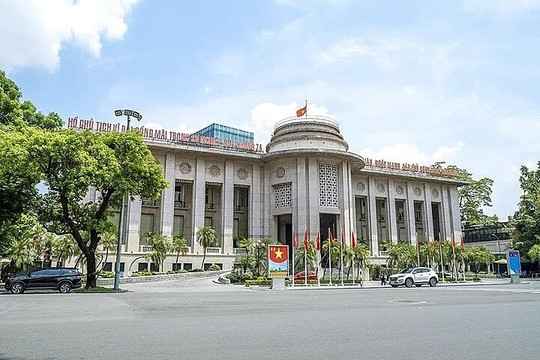 VNese, Lao central banks discuss cooperation in using local currencies in trade