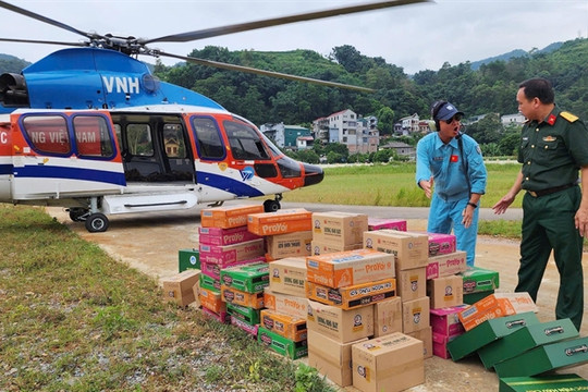 More helicopters take flight to transport relief packages for flood victims