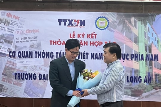 Vietnam News Agency's southern branch to co-operate with Long An University of Economics and Industry
