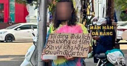 Thanh niên Nga cầm biển 'xin tiền đi du lịch' trên đường phố Đà Nẵng