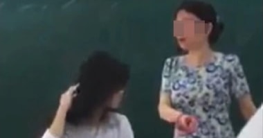 Vụ cắt tóc nữ sinh trên bục giảng: 'Khó kết luận cô giáo đúng hay sai'