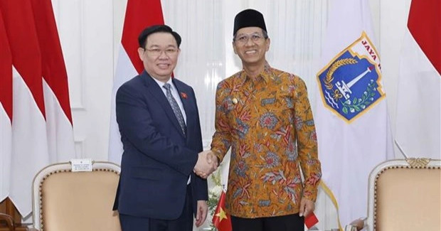Chủ tịch Quốc hội Vương Đình Huệ tiếp Thống đốc Đặc khu Thủ đô Jakarta