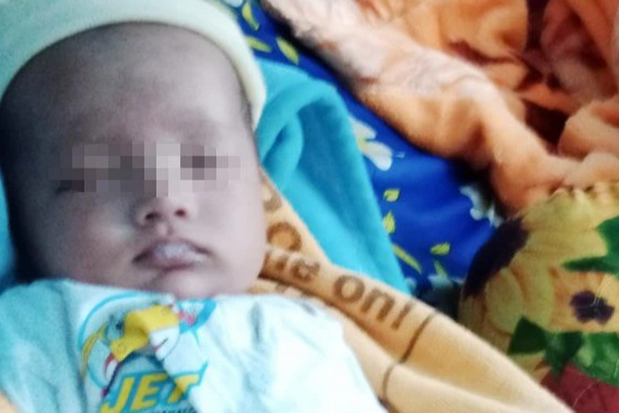 Bé trai 1 tháng tuổi bị bỏ rơi trước cổng chùa ở TPHCM