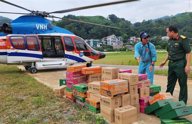 More helicopters take flight to transport relief packages for flood victims