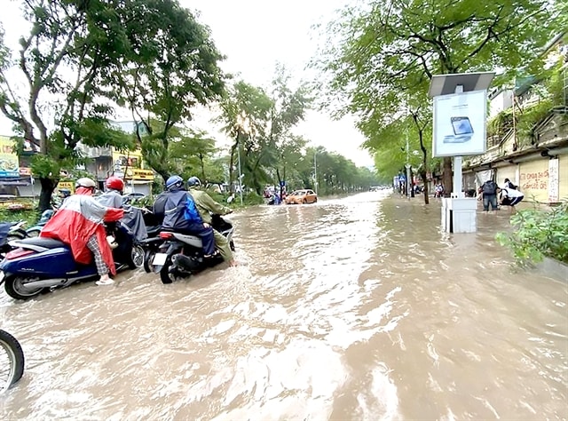 Flooding issues plaguing Hà Nội and HCM City cannot be immediately solved: experts