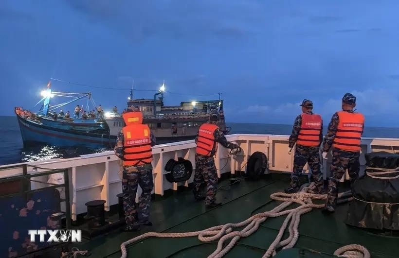 Fishing vessel in distress towed to Song Tu Tay island